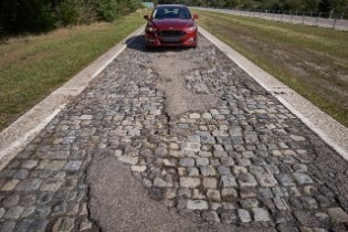 Bumpy Commute? Try Driving on the World’s Worst Road – a ...