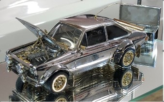 Tiny Classic Ford Escort Made of Gold, Diamonds and Silve...