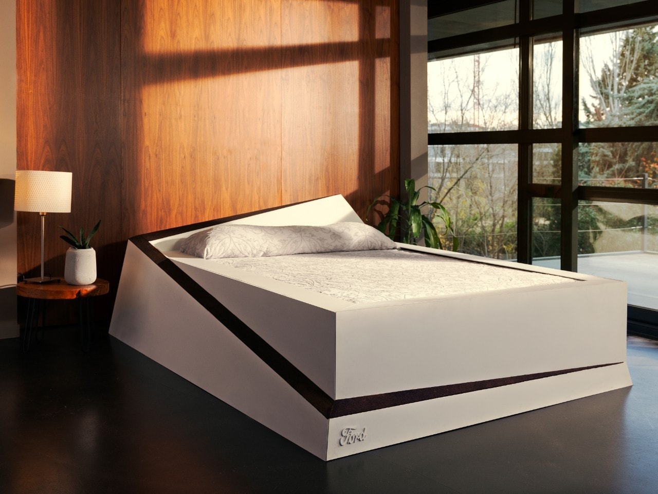 Smart Bed Rolls Selfish Sleepers Back into Place – Using Car Tech and a Conveyor Belt 